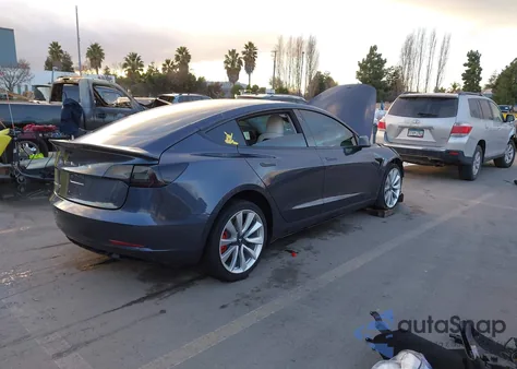 2018 Tesla Model 3 Long Range/Mid Range from USA, damaged, VIN 5YJ3E1EA9JF169071